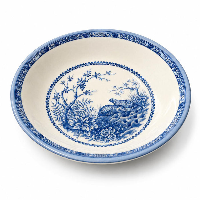 Blue and white English china cereal bowl featuring a detailed quail and floral pattern with a decorative rim.