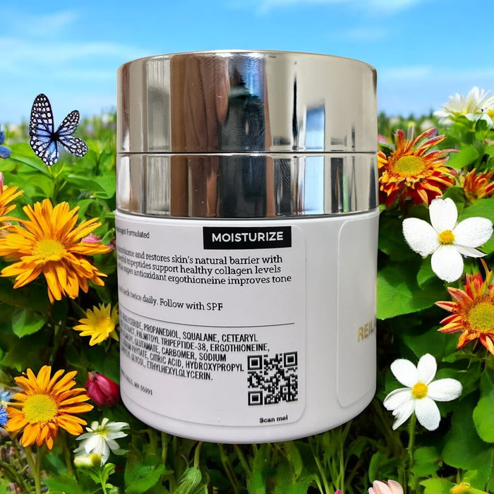 Rear view of Reiland Advanced Skin Restore jar with visible ingredients, placed in a vibrant floral setting with a butterfly, emphasizing natural and skin-soothing benefits.