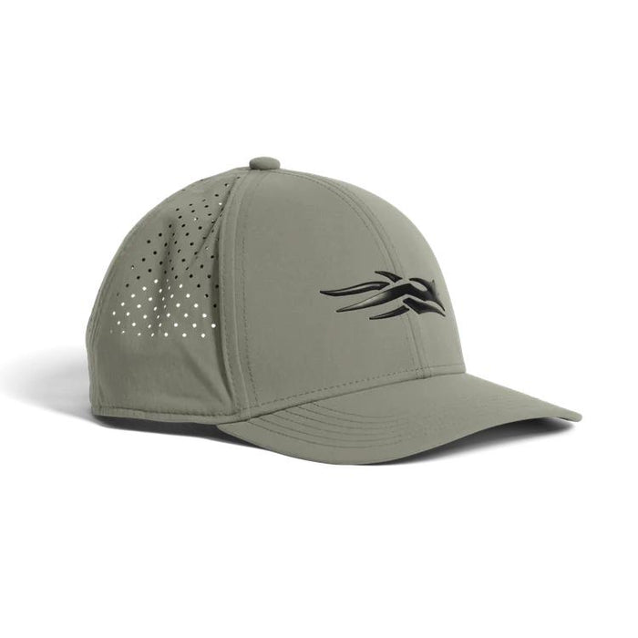 Olive green Sitka Icon Plus trucker cap with a raised black logo, structured mid-profile, and laser-perforated mesh sides.