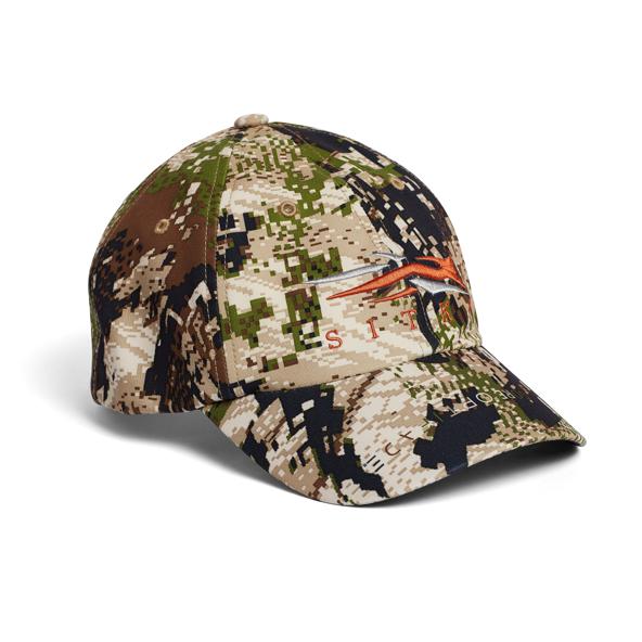 Sitka Traverse cap in camo print with an embroidered logo, featuring a durable water-repellent finish and adjustable fit.