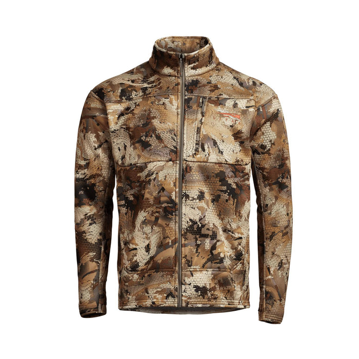 Sitka Traverse hunting jacket in camo print with a full-zip front, high collar, and chest pocket on a white background.