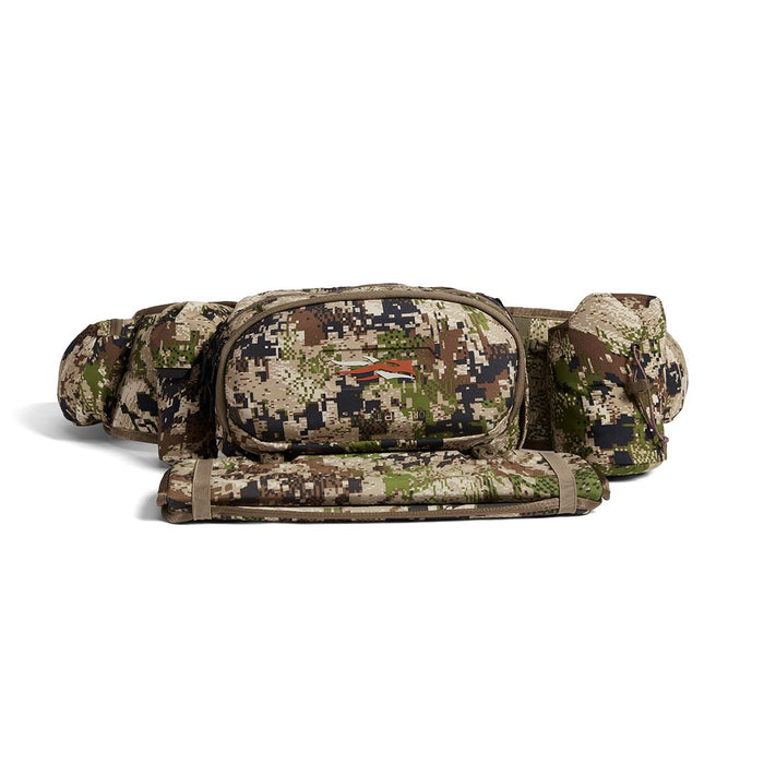 Sitka Turkey Tool Belt in camo print with specialized call pockets and a removable padded seat for hunting mobility.