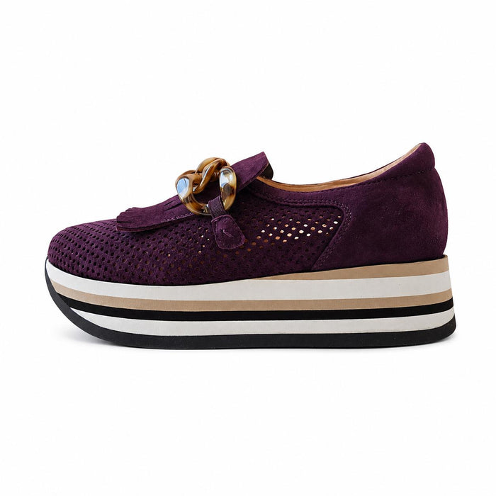 Softwaves Carly sneaker in purple perforated suede with a chunky striped platform sole and decorative tortoise chain.