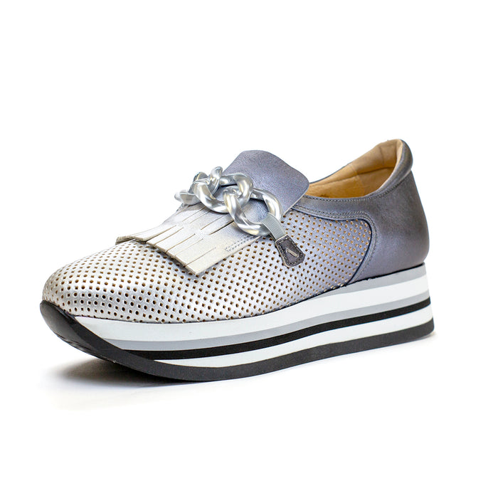 Softwaves Cynthia metallic leather sneaker with fringe, chain detail, and a striped platform sole.