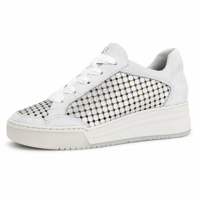 Softwaves Lua sneaker in light grey suede with metallic silver circular cut-out leather panels and a thick white sole.