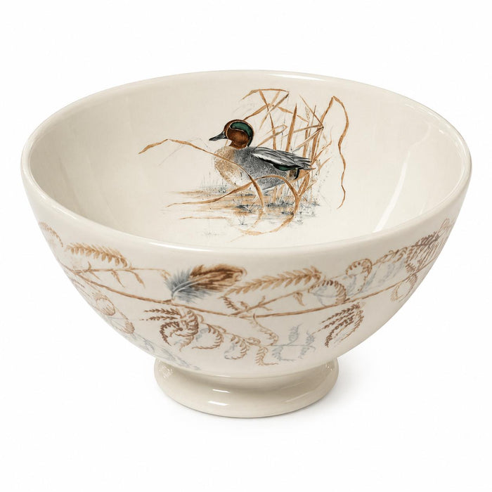 Cream-colored ceramic Sologne bowl featuring a detailed duck and reed illustration with a delicate botanical exterior pattern.