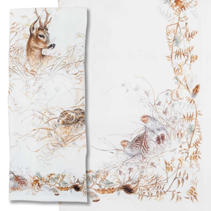 Set of two white 100% cotton Sologne tea towels featuring detailed watercolor illustrations of woodland wildlife.
