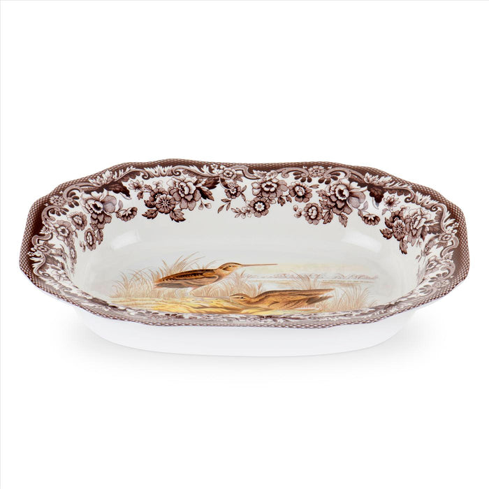 Spode Woodland 11.5-inch porcelain vegetable dish featuring a snipe bird illustration and brown floral border.