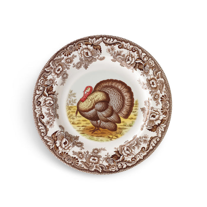 Spode Woodland earthenware soup plate featuring a turkey center and brown British Flowers floral border.