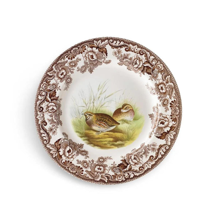 Spode Woodland earthenware soup plate featuring a quail motif and brown British Flowers floral border, 9-inch diameter.