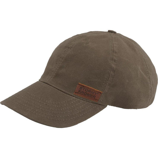 Brown waxed cotton Stormy Kromer baseball cap with a structured crown and branded leather patch.