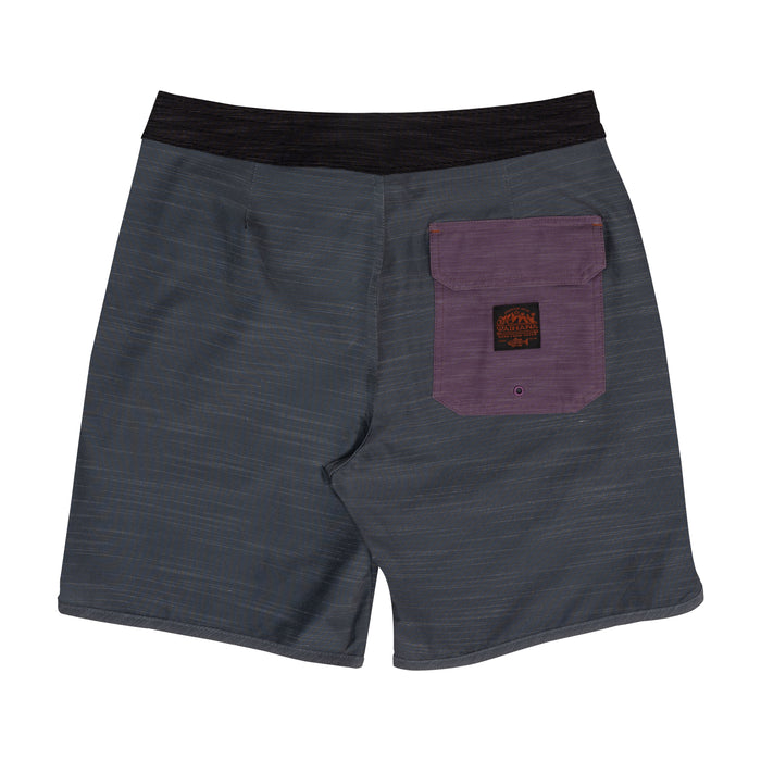 Back view of Waihana Tidal Moss Cruiser Board Shorts featuring a grey striped fabric, purple back pocket with Waihana logo patch, and black waistband on a white background.