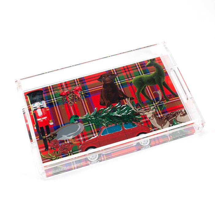 Clear acrylic vanity tray featuring a festive red plaid pattern with a nutcracker, deer, and holiday car motifs.