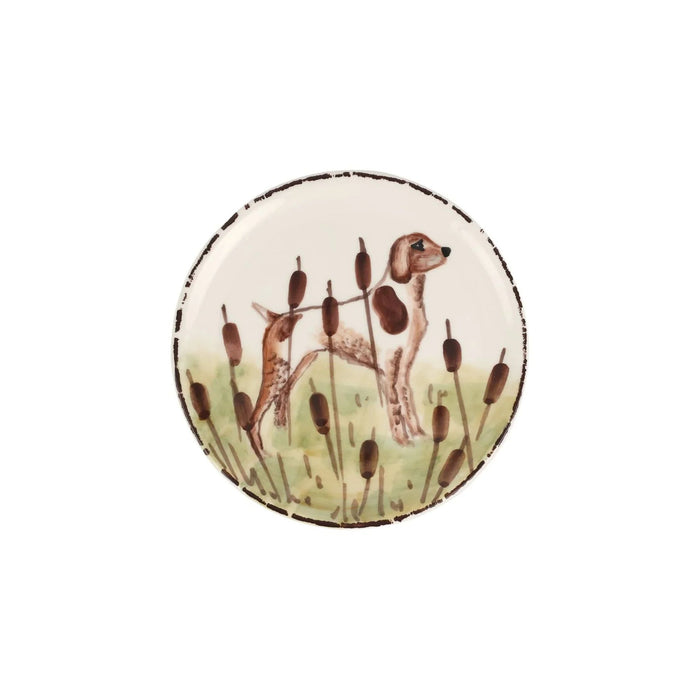Hand-painted 6.75-inch ceramic canape plate featuring a brown hunting dog in a cattail marsh, crafted in Tuscany.