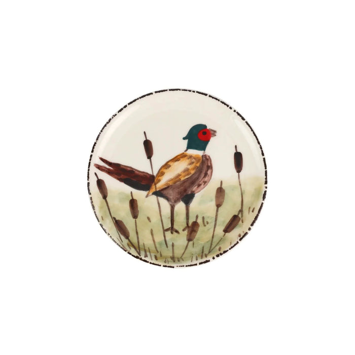 Hand-painted 6.75-inch ceramic canapé plate featuring a colorful pheasant in a marsh setting with a rustic dark rim.