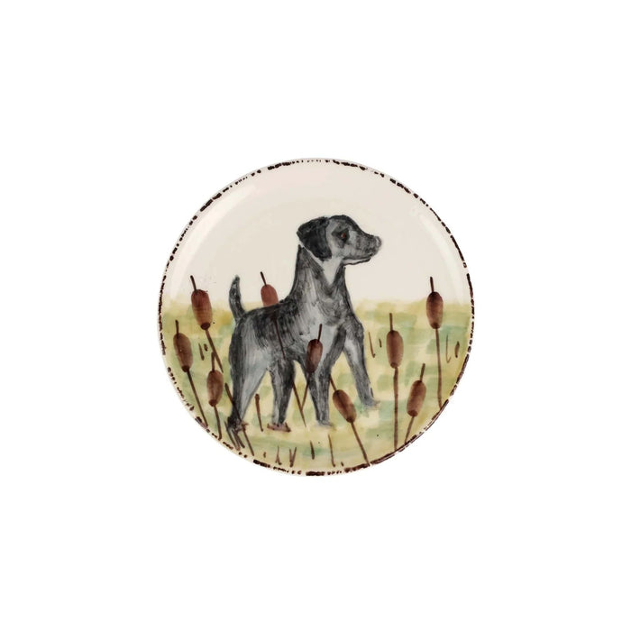 Hand-painted 6.75-inch ceramic canape plate featuring a black dog in a cattail field with a rustic brown rim.
