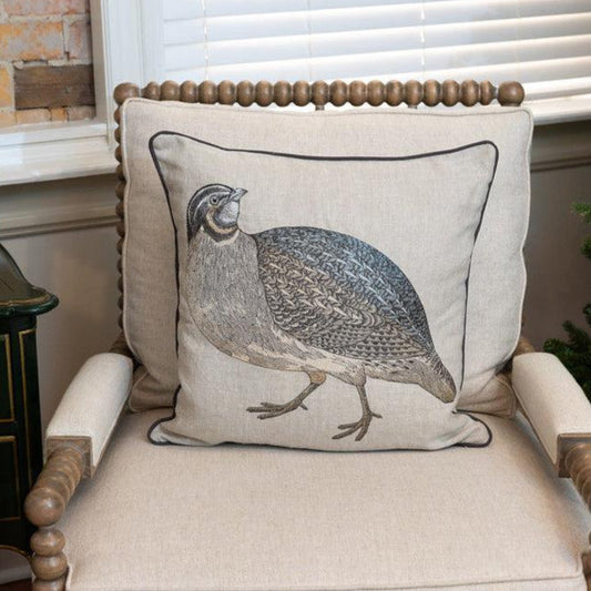 Set of two 20x20 inch beige linen pillows featuring detailed vintage quail embroidery and refined dark cording.