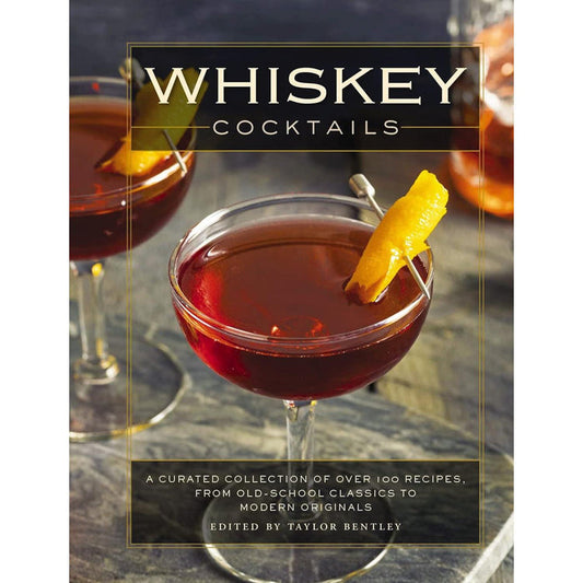 Whiskey Cocktails book cover featuring amber drinks in coupe glasses with orange peel garnishes on a dark slate surface.