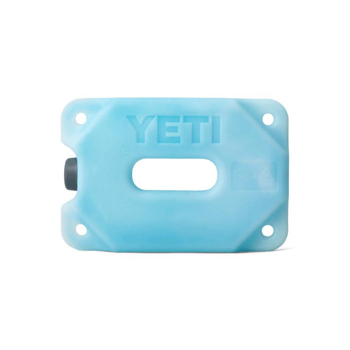Light blue YETI ice block with a durable, rectangular design and a central handle cutout for easy transport.