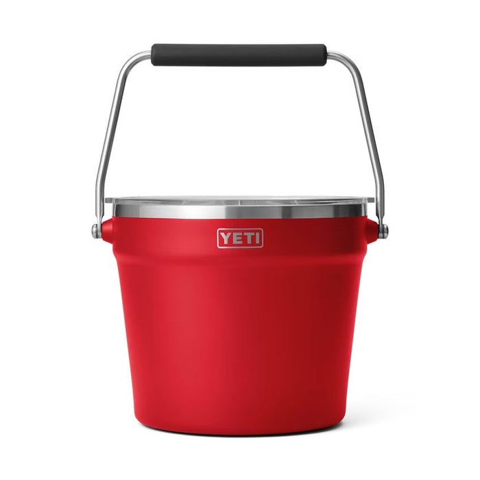 Red YETI Rambler beverage bucket with a stainless steel rim, clear lid, and a sturdy rotating handle with black grip.